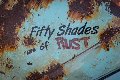 Fifty shades of rust printed logo on a rusty surface