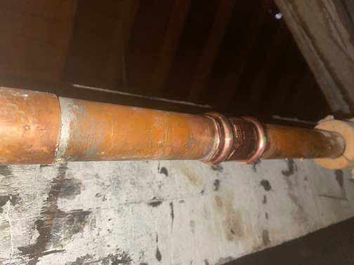 a burst pipe that has been repaired.