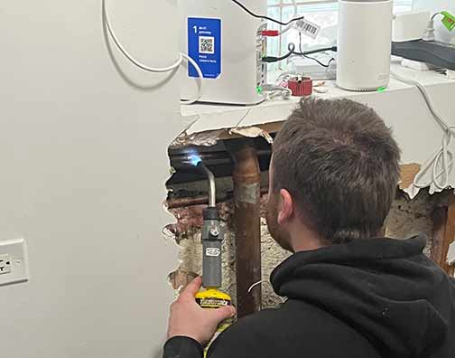 emergency burst pipe repair at a chicago laundromat.