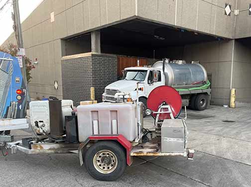 commercial drain cleaning plumbers helping out a business in chicago.