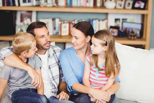 a man educating his family about the home sewer system.