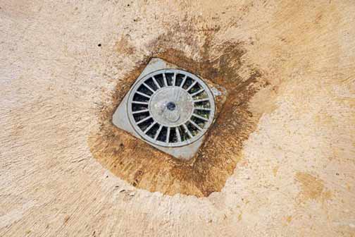 a clogged garage floor drain.