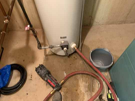 flushing a hot water heater tank out.