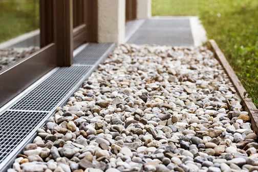 a french drain installation to help prevent basement drain backups.