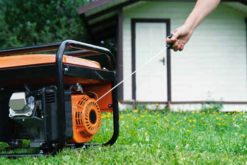 a man using a backup generator