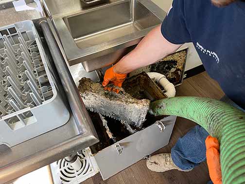 regular grease trap cleaning benefits