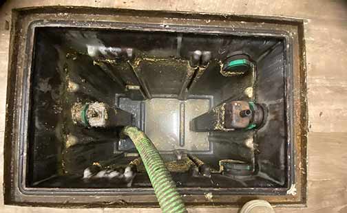 a grease trap cleaning in a chicago restaurant