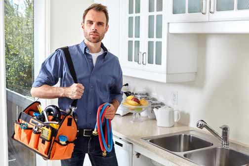 an emergency plumber ready to make repairs