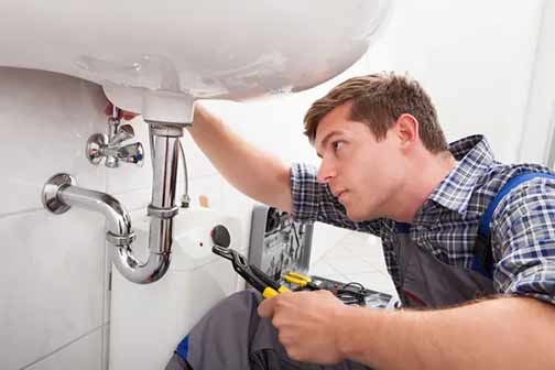 a plumbing in chicago making repairs.