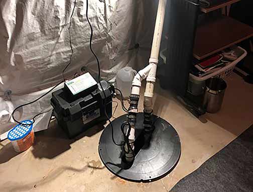 a sump pump with a battery backup system.