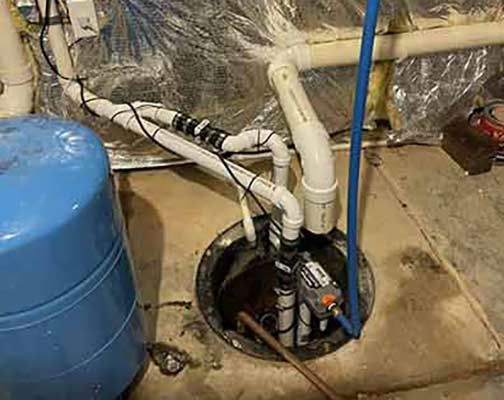 a sump pump after having discharge line cleaned.